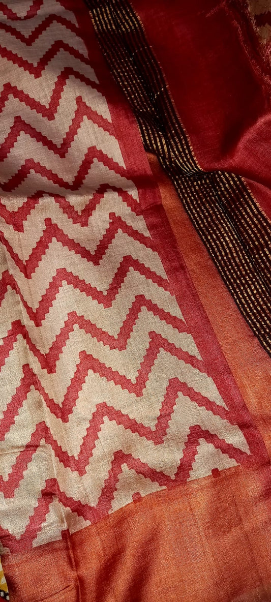 Pure tussar zari Saree printed in ikkat patten half white and red color