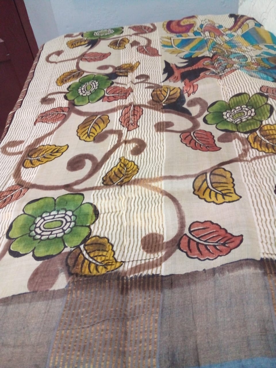 Hand painted pen Kalamkari in Pure tussar Saree cream color with hibiscus flowers with leaves