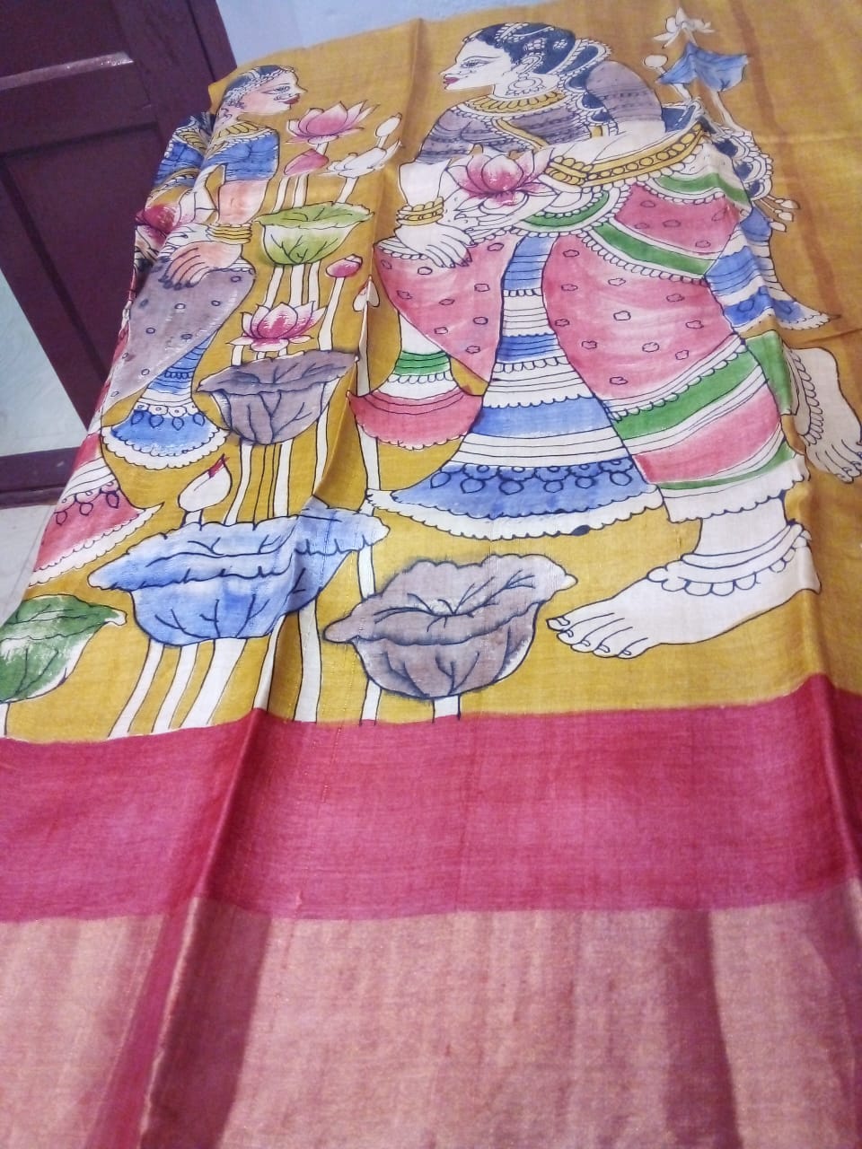 Pen Kalamkari in Pure Zari Tussar Saree yellow color with womens story telling with nature background body