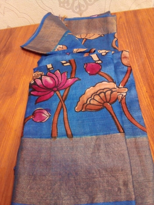 Hand painted Pen Kalamkari in Pure Zari Tussar Saree Blue with Pink border with lotus flowers with cow story